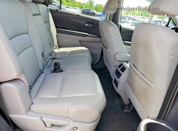 5FNYF6H90LB000576 2020 HONDA PILOT Silver Rear interior view