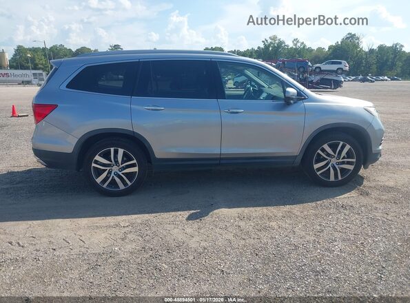 5FNYF6H92HB026104 2017 HONDA PILOT Silver Widok wnętrza z tyłu
