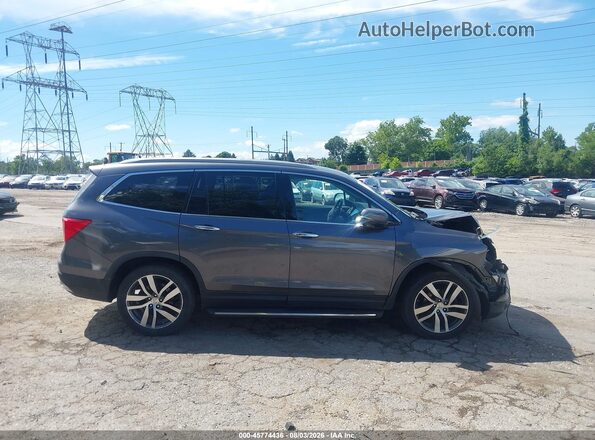 5FNYF6H94HB010020 2017 HONDA PILOT Gray Widok wnętrza z tyłu