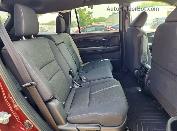 5FNYF7H26LB004009 2020 HONDA PASSPORT Burgundy Rear interior view