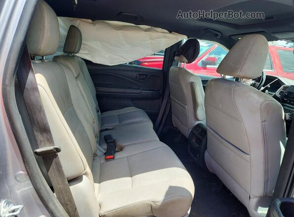 5FNYF7H55NB005827 2022 HONDA PASSPORT Silver Вид задньої частини салону