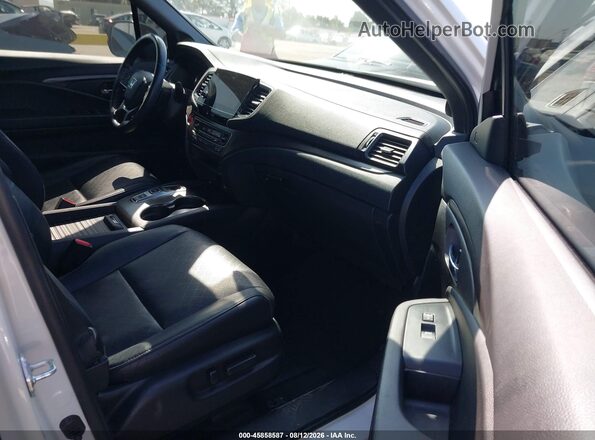 5FNYF7H57MB007772 2021 HONDA PASSPORT White Widok wnętrza z przodu
