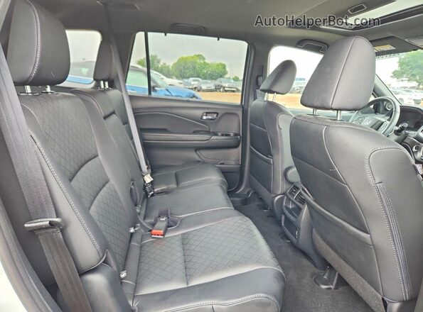 5FNYF7H59LB001910 2020 HONDA PASSPORT White Widok wnętrza z tyłu