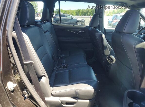 5FNYF7H91KB007993 2019 HONDA PASSPORT Burgundy Rear seats view