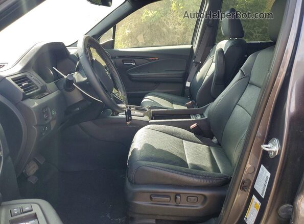 5FNYF8H01MB030099 2021 HONDA PASSPORT Gray Widok wnętrza z przodu