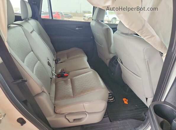 5FNYF8H02MB008659 2021 HONDA PASSPORT White Rear interior view