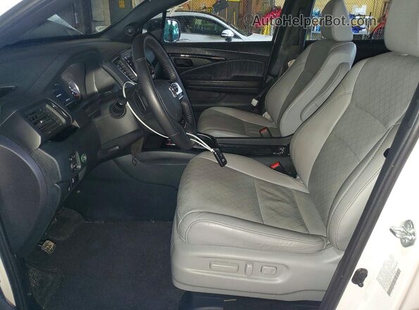 5FNYF8H06PB037148 2023 HONDA PASSPORT White წინა სალონის ხედი