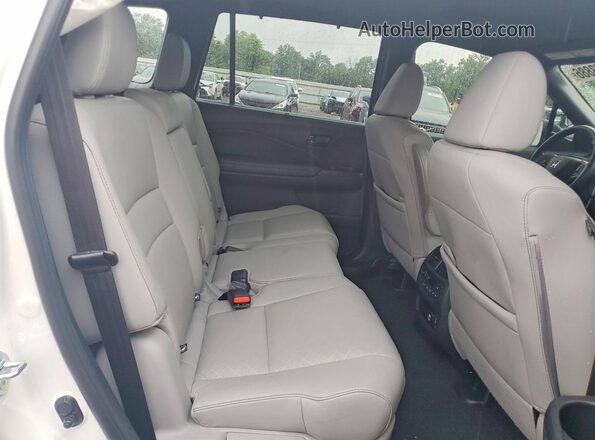 5FNYF8H06PB037148 2023 HONDA PASSPORT White უკანა სალონის ხედი
