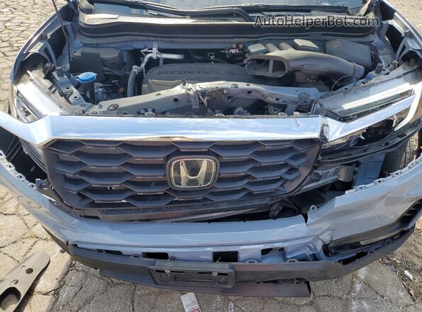 5FNYF8H52NB030271 2022 HONDA PASSPORT Blue ძრავის განყოფილების ხედი