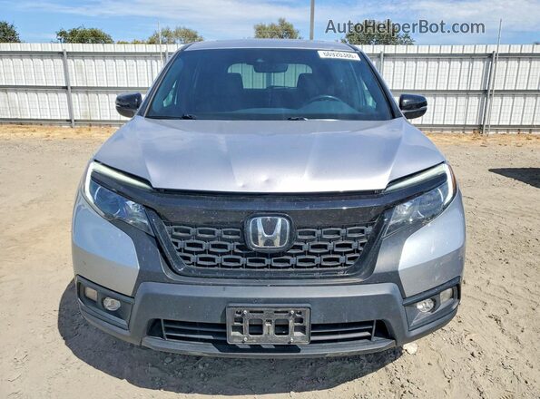5FNYF8H55MB033535 2021 HONDA PASSPORT Silver Rear seats view