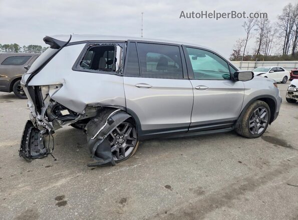 5FNYF8H55PB027867 2023 HONDA PASSPORT Серебряный Задняя правая четверть