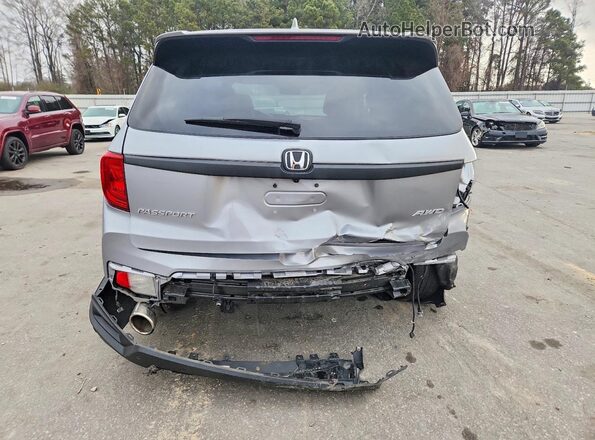 5FNYF8H55PB027867 2023 HONDA PASSPORT Серебряный Вид сзади