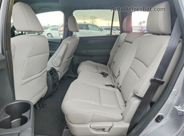 5FNYF8H55PB027867 2023 HONDA PASSPORT Серебряный Вид задней части салона
