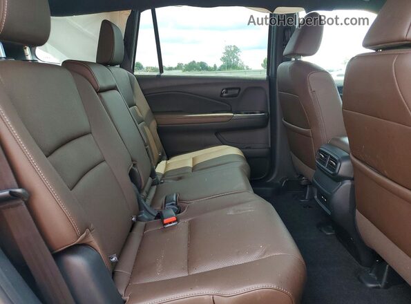 5FNYF8H55SB004632 2025 HONDA PASSPORT White Rear interior view