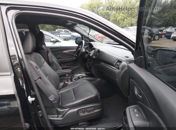 5FNYF8H56MB031034 2021 HONDA PASSPORT Black Front interior view
