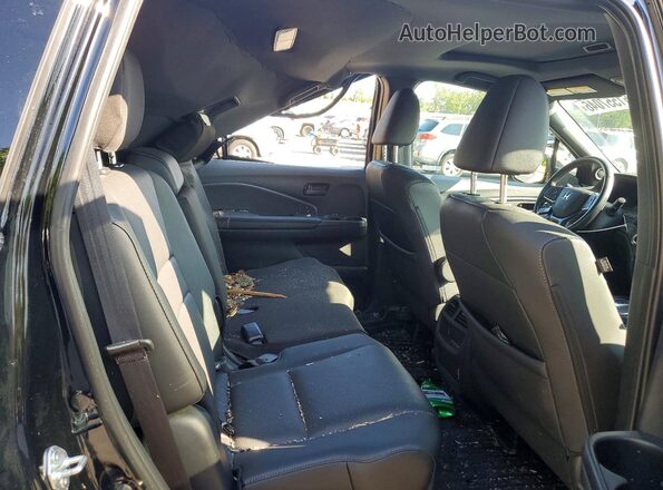 5FNYF8H56PB039946 2023 HONDA PASSPORT Black Widok wnętrza z tyłu