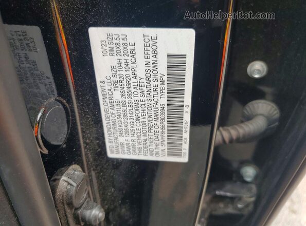 5FNYF8H56PB039946 2023 HONDA PASSPORT Black Widok naklejki z numerem VIN