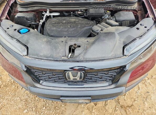 5FNYF8H57MB016879 2021 HONDA PASSPORT Burgundy Вид задньої частини салону