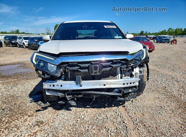 5FNYF8H57PB002758 2023 HONDA PASSPORT White Vista frontal