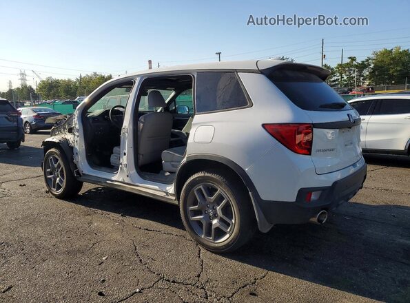 5FNYF8H57PB033606 2023 HONDA PASSPORT White Trasero izquierdo