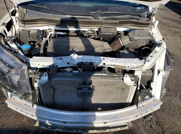 5FNYF8H57PB033606 2023 HONDA PASSPORT White Vista interior trasera