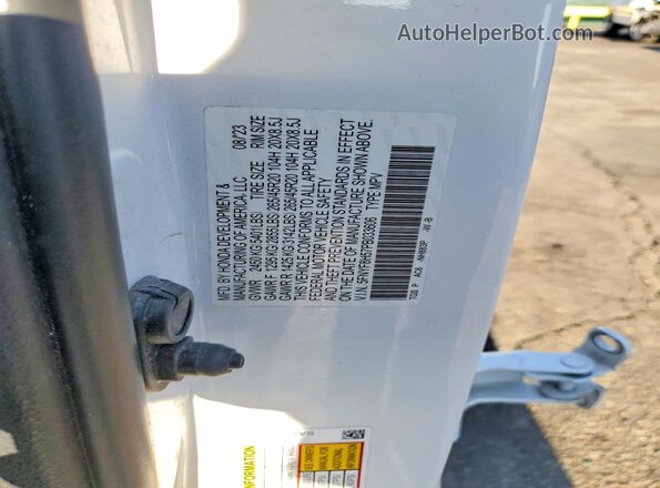 5FNYF8H57PB033606 2023 HONDA PASSPORT White Vista de la etiqueta del VIN