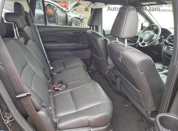 5FNYF8H58PB043111 2023 HONDA PASSPORT Black Widok wnętrza z tyłu