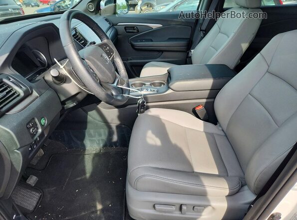 5FNYF8H59RB008693 2024 HONDA PASSPORT White წინა სალონის ხედი