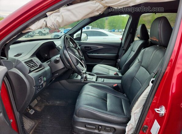 5FNYF8H60PB036436 2023 HONDA PASSPORT Red Вид салону спереду