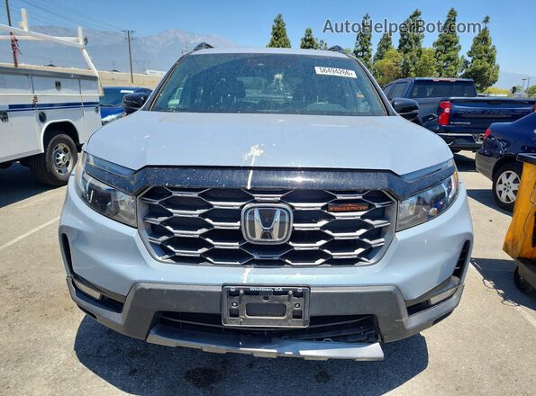 5FNYF8H61PB002957 2023 HONDA PASSPORT Gray Widok z przodu