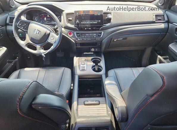 5FNYF8H61PB002957 2023 HONDA PASSPORT Gray Widok deski rozdzielczej