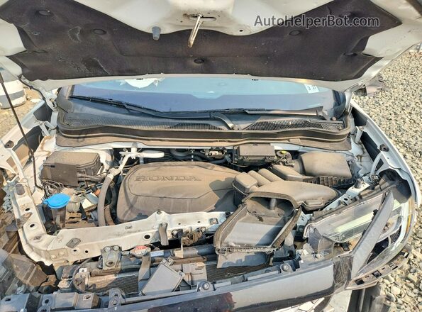 5FNYF8H62NB007808 2022 HONDA PASSPORT White Vista interior trasera