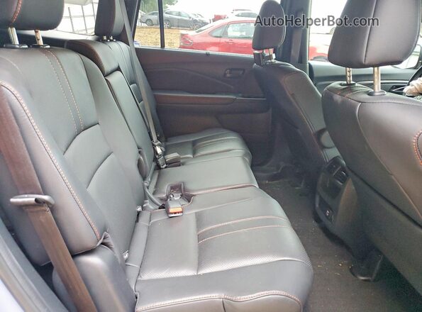 5FNYF8H62NB024771 2022 HONDA PASSPORT Blue Vista interior trasera