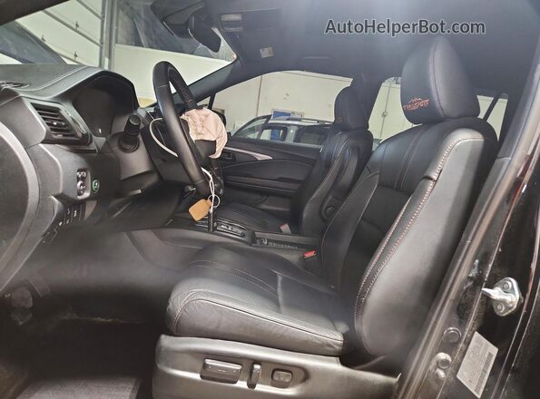 5FNYF8H67PB008827 2023 HONDA PASSPORT Black Front interior view