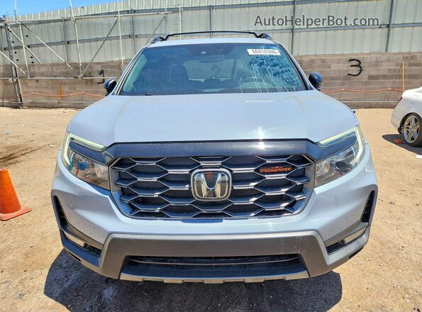 5FNYF8H69PB034278 2023 HONDA PASSPORT Gray Widok z przodu