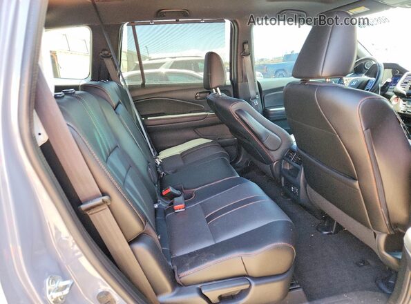 5FNYF8H69PB034278 2023 HONDA PASSPORT Gray Widok wnętrza z tyłu