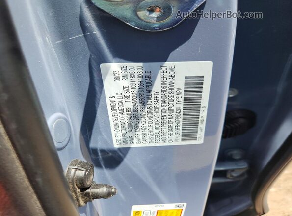 5FNYF8H69PB034278 2023 HONDA PASSPORT Gray Widok naklejki z numerem VIN
