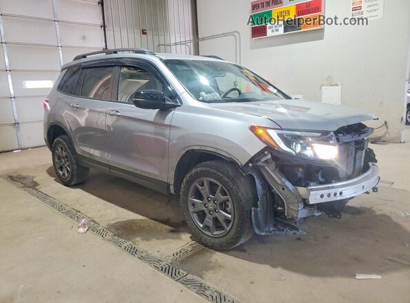 5FNYF8H69RB004572 2024 HONDA PASSPORT Серебряный Передняя правая четверть