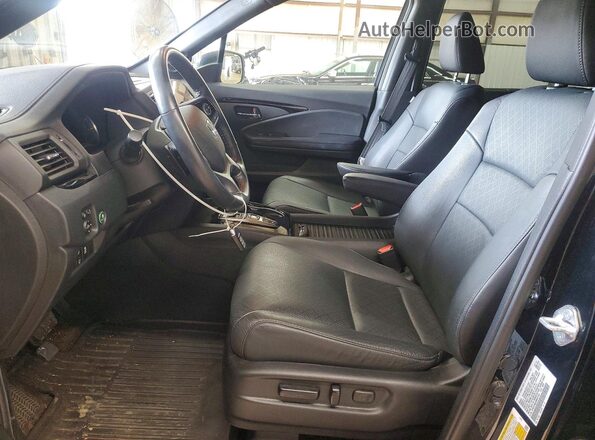 5FNYF8H91MB017383 2021 HONDA PASSPORT Black Front interior view
