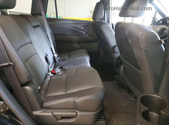 5FNYF8H91MB017383 2021 HONDA PASSPORT Black Rear interior view