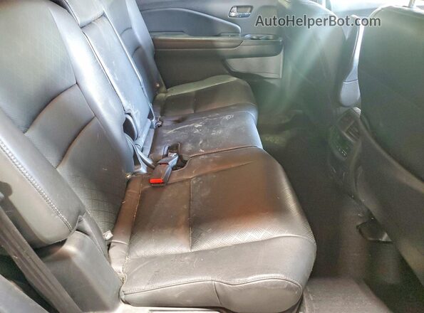 5FNYF8H97KB027302 2019 HONDA PASSPORT Black Rear interior view