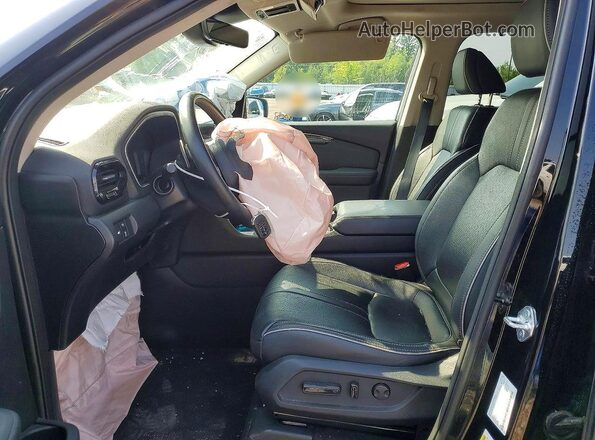 5FNYG1H76PB504067 2023 HONDA PILOT Black Front interior view