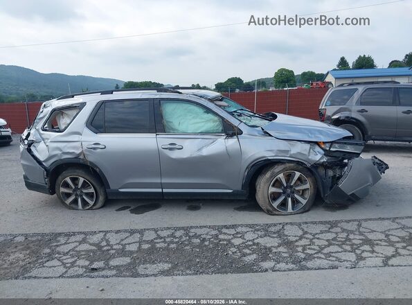 5FNYG1H81PB004858 2023 HONDA PILOT Silver Սալոնի հետևի տեսք