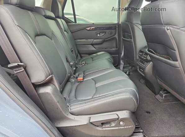 5FNYG2H70PB006050 2023 HONDA PILOT Teal Vista interior trasera
