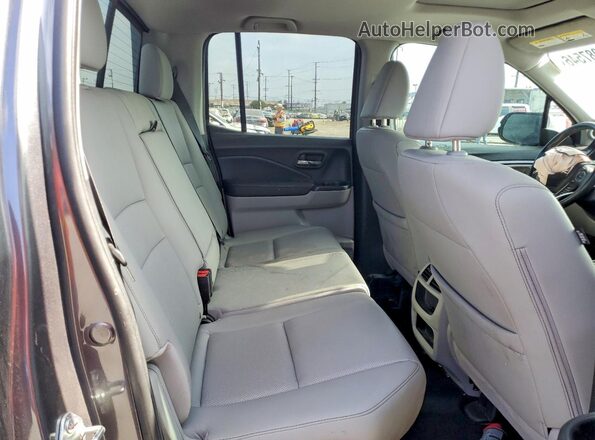 5FPYK3F54PB039730 2023 HONDA RIDGELINE Gray Rear interior view