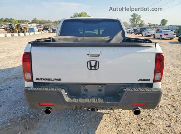 5FPYK3F56PB042595 2023 HONDA RIDGELINE White Vista trasera