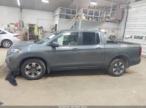 5FPYK3F58HB019563 2017 HONDA RIDGELINE Silver Rear interior view