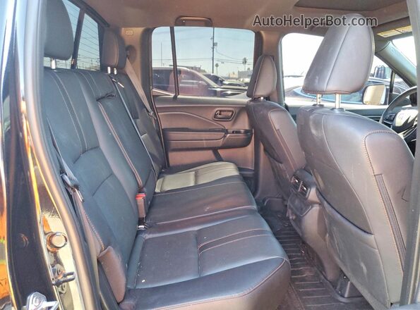 5FPYK3F6XRB025780 2024 HONDA RIDGELINE Black Vista de los asientos traseros
