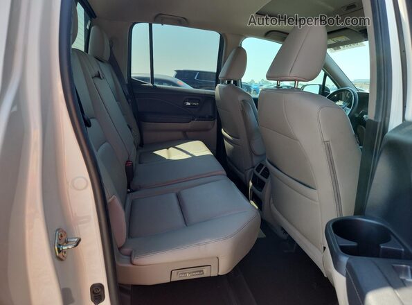 5FPYK3F75KB022140 2019 HONDA RIDGELINE White Vista de los asientos traseros