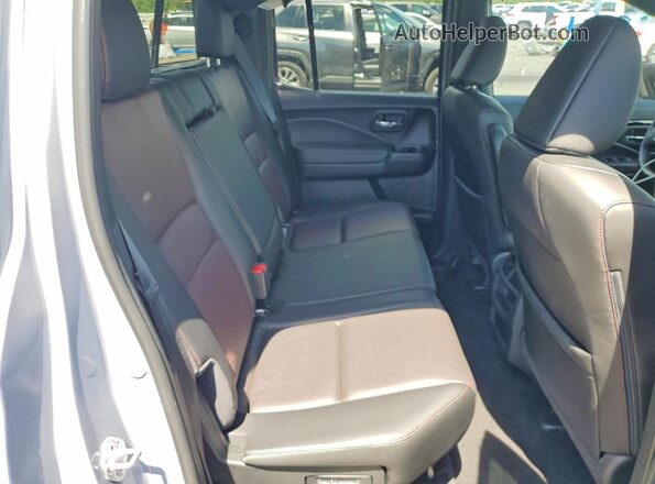 5FPYK3F85PB054442 2023 HONDA RIDGELINE Silver Rear seats view